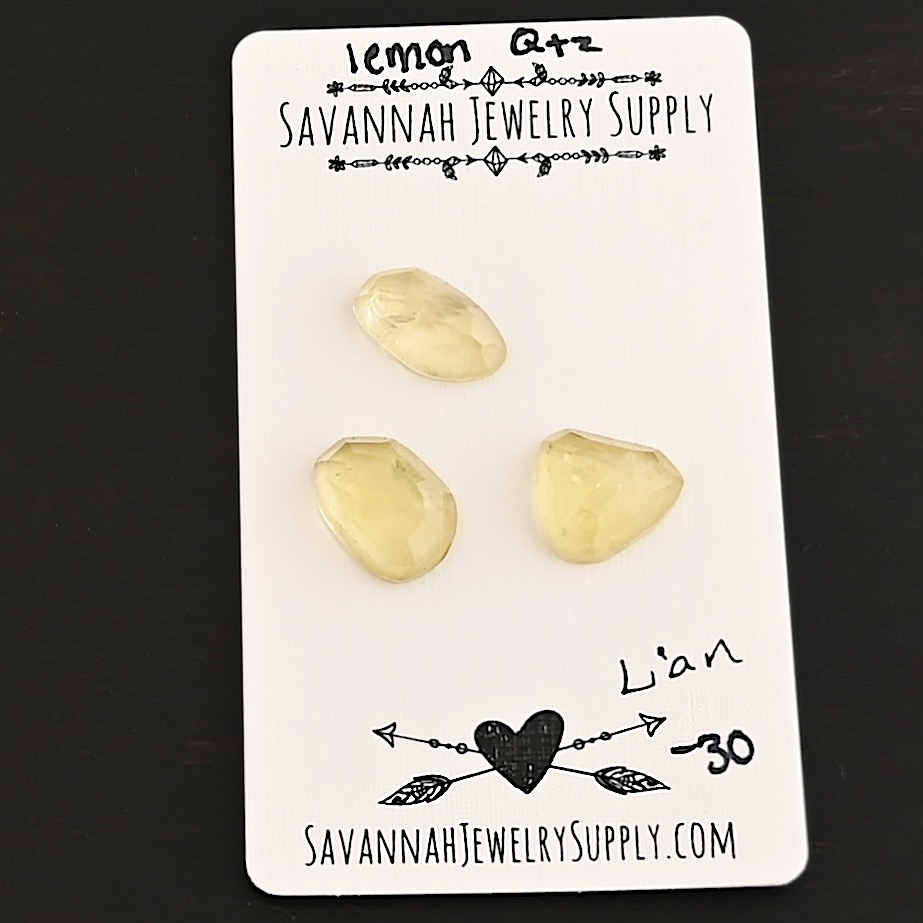 Lian Rose Cut Lemon Quartz Cabochon Parcel shown on business card