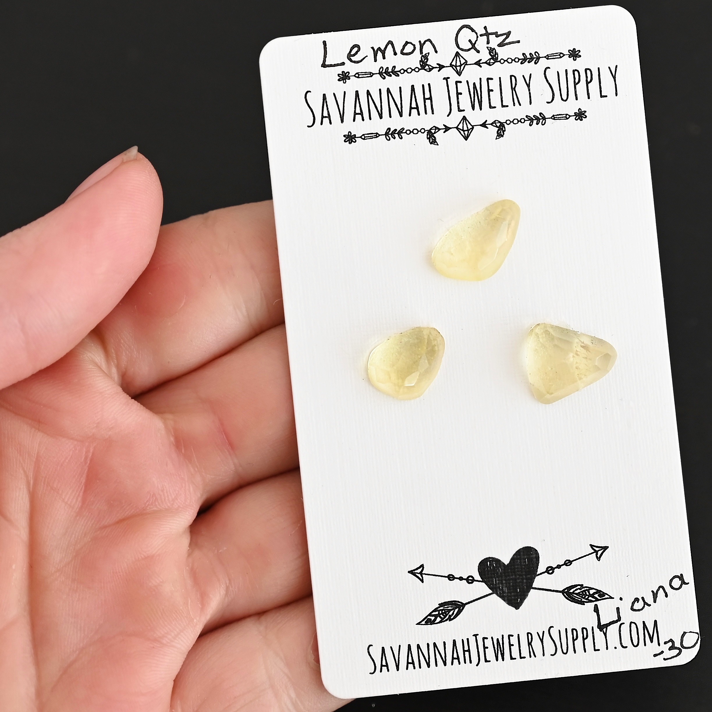 Liana Rose Cut Lemon Quartz Cabochon Parcel shown in hand