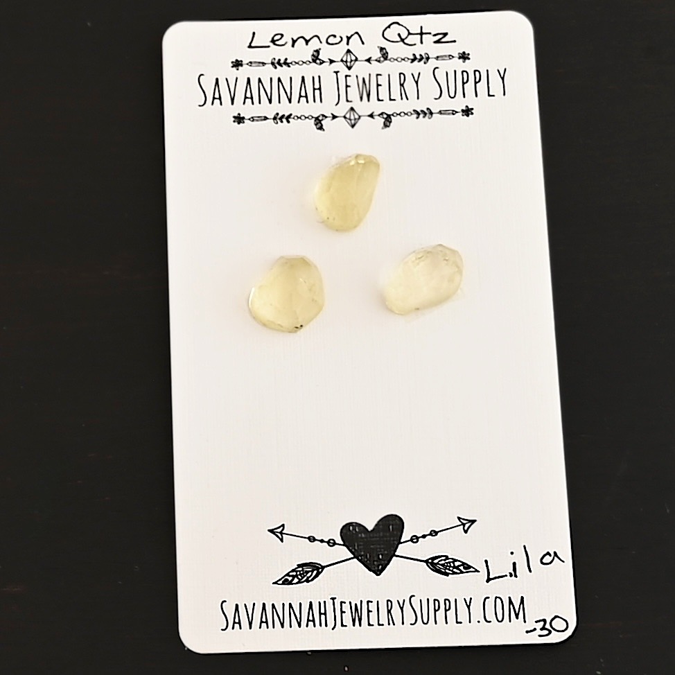 Lila Rose Cut Lemon Quartz Cabochon Parcel shown on business card