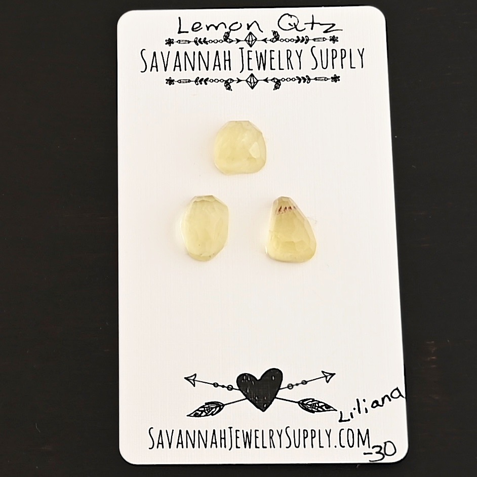 Liliana Rose Cut Lemon Quartz Cabochon Parcel shown on business card