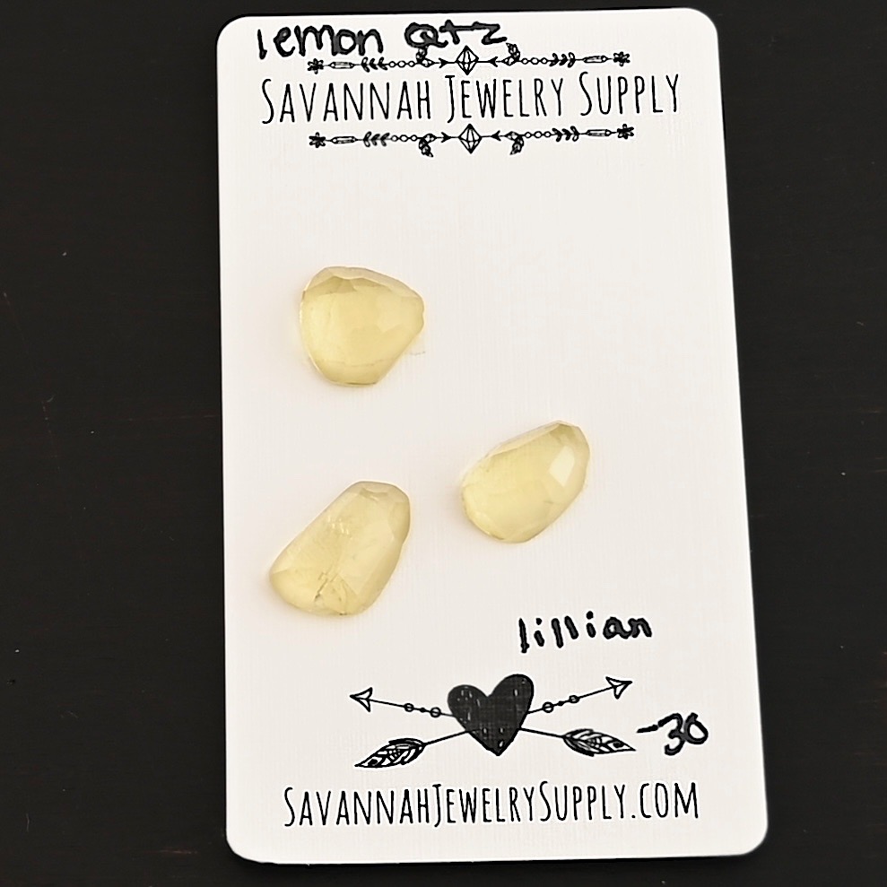 Lillian Rose Cut Lemon Quartz Cabochon Parcel shown on business card
