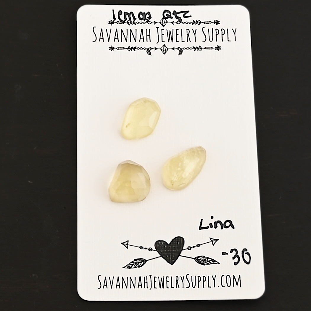 Lina Rose Cut Lemon Quartz Cabochon Parcel shown on business card