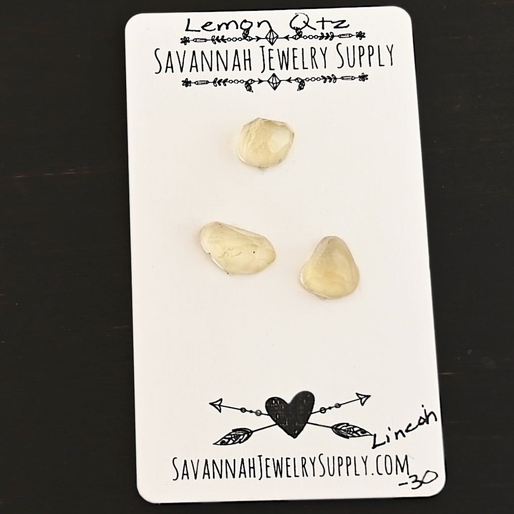 Lincoln Rose Cut Lemon Quartz Cabochon Parcel shown on business card