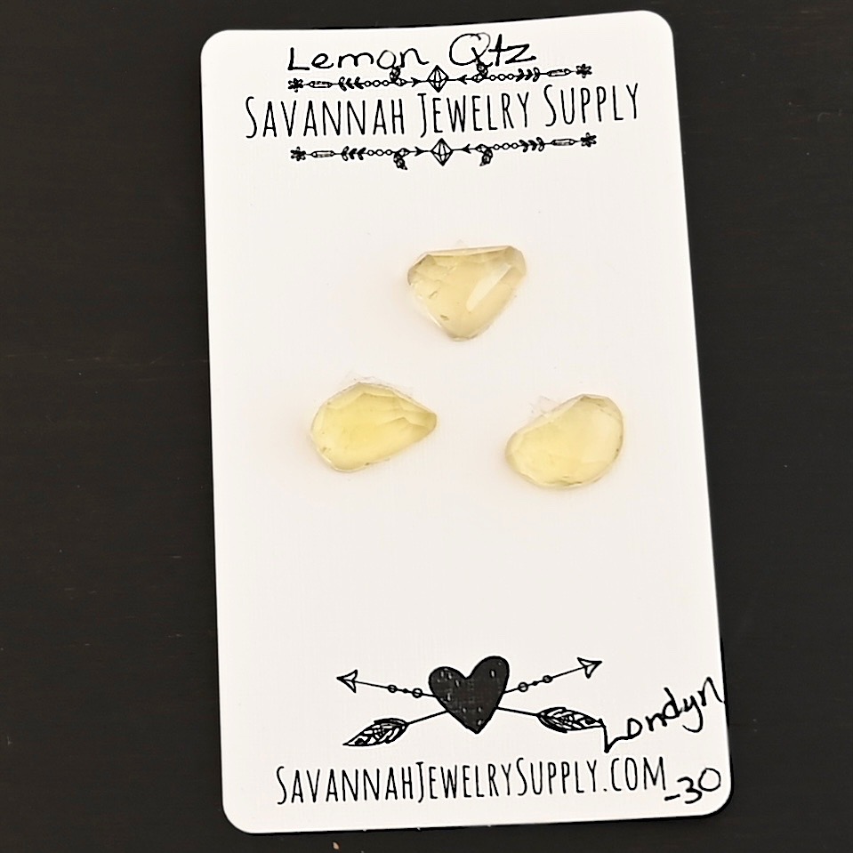 Londyn Rose Cut Lemon Quartz Cabochon Parcel shown on business card