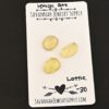 Lottie Rose Cut Lemon Quartz Cabochon Parcel shown on business card