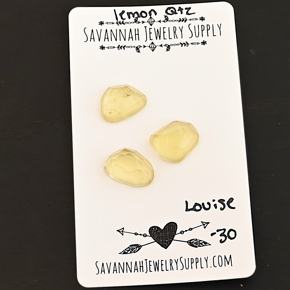 Louise Rose Cut Lemon Quartz Cabochon Parcel shown on business card