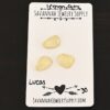 Lucas Rose Cut Lemon Quartz Cabochon Parcel shown on business card