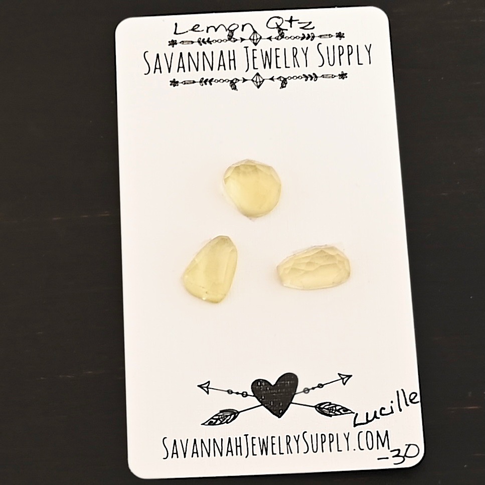 Lucille Rose Cut Lemon Quartz Cabochon Parcel shown on business card
