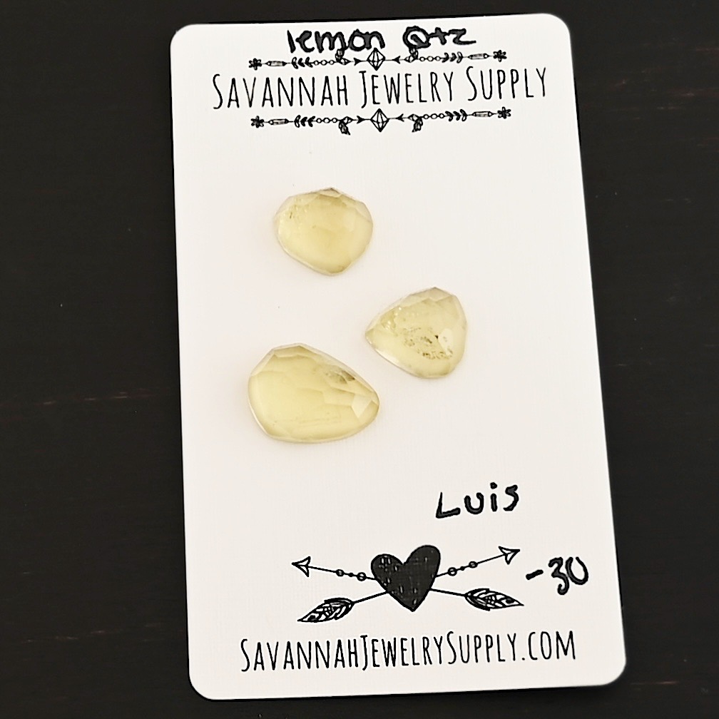Luis Rose Cut Lemon Quartz Cabochon Parcel shown on business card