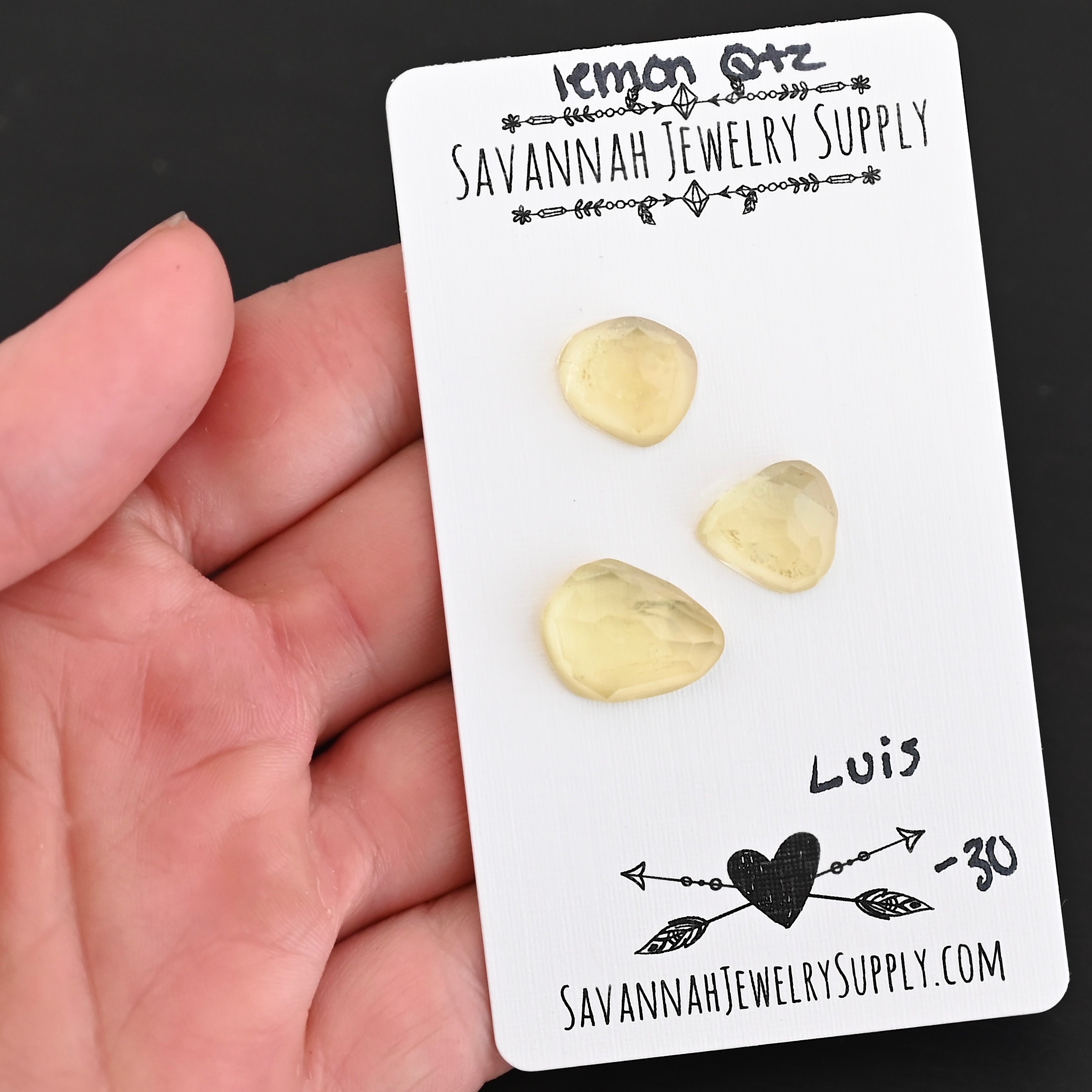 Luis Rose Cut Lemon Quartz Cabochon Parcel shown in hand